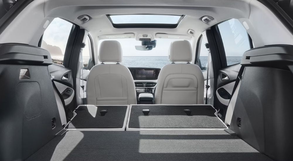 The black and white interior from the cargo area on a 2026 Buick Encore GX.