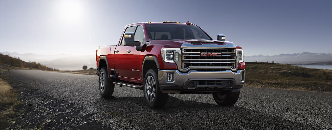 Red 2020 GMC Sierra 2500 HD on an open road