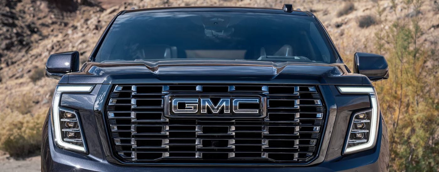Black 2026 GMC Yukon close up of the grille.