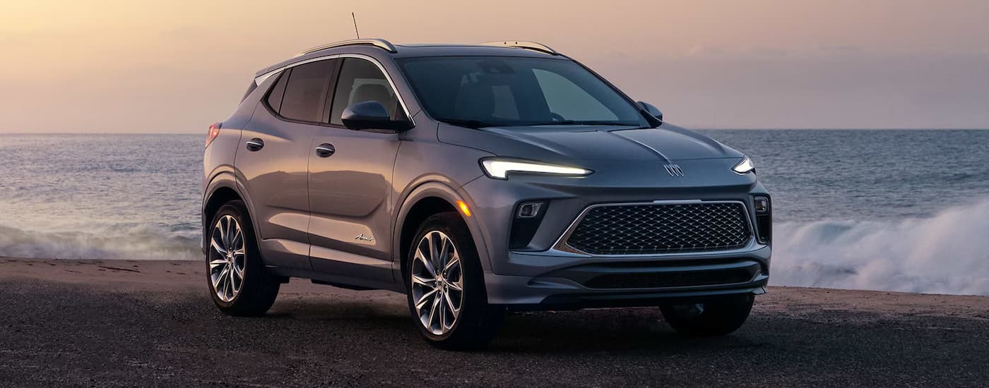 Grey 2026 Buick Encore GX parked off-road.