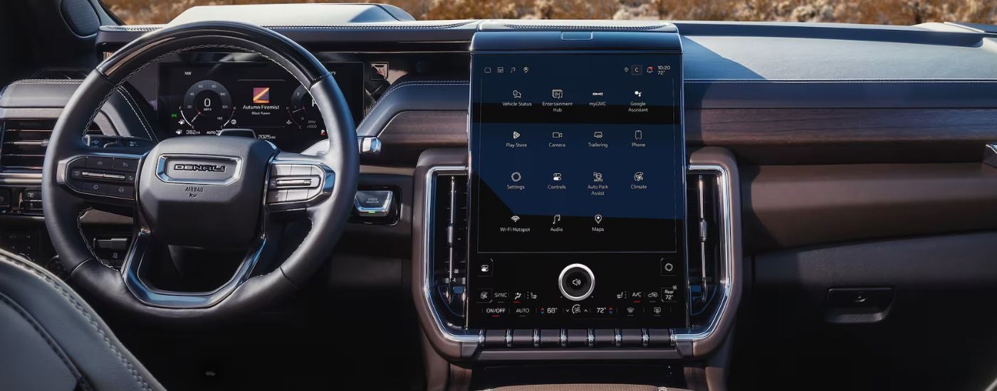 The infotainment display and steering wheel on a 2026 GMC Yukon.