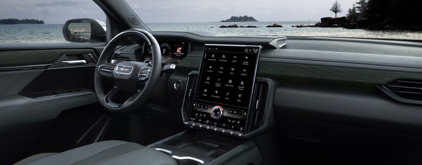 The black interior of a 2026 GMC Acadia.