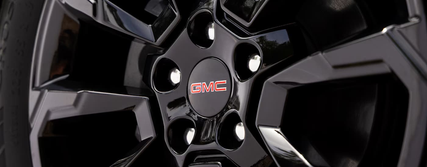 Black rim on a 2025 GMC Terrain at a GMC dealer
