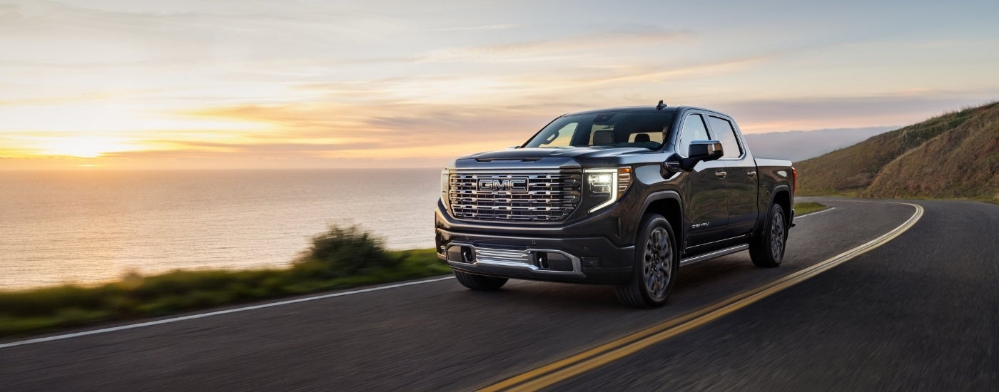 A grey 2025 GMC Sierra 1500 for sale from the front at an angle.