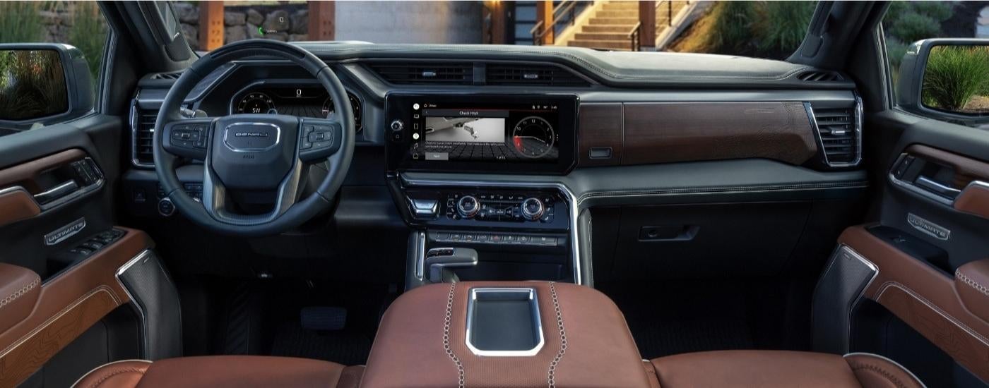 The brown interior of a 2025 GMC Sierra 1500.