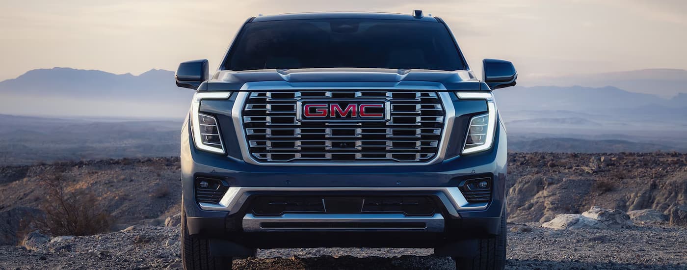Front grille on a blue 2026 GMC Yukon Denali
